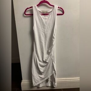 Cute white bodycon dress with adorable details (cinching and a-line)